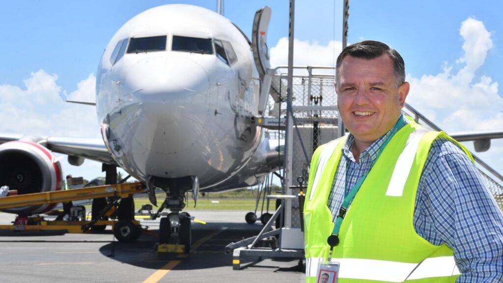 man standing near plane
